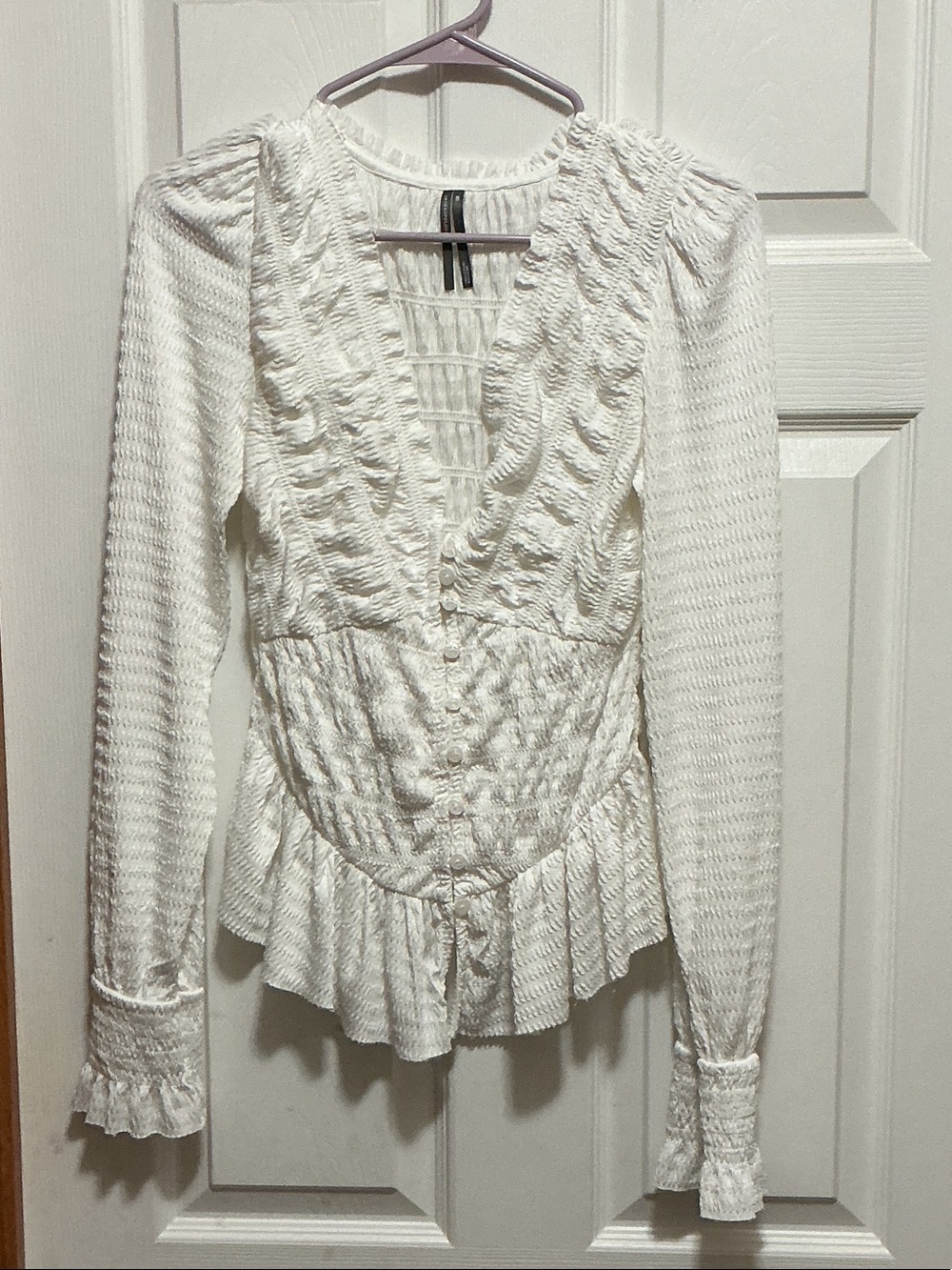Anthropologie Cream Textured Ruffle Peplum Long Sleeve Top
